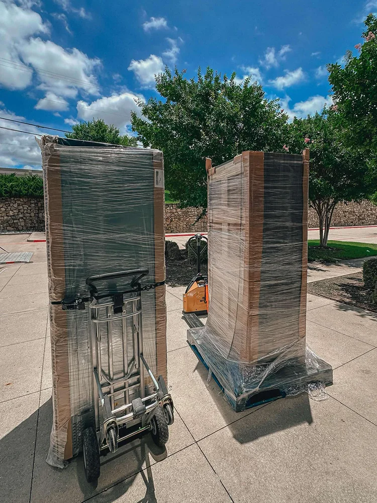 Vending machines wrapped and ready for moving on dollies in Dallas Fort Worth