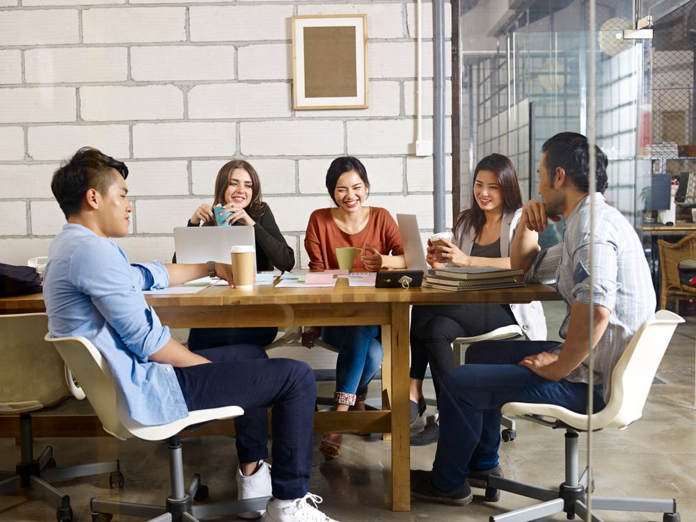 office workers having coffee at the breakroom