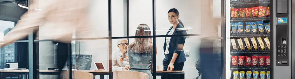 office meeting area with a vending machine nearby