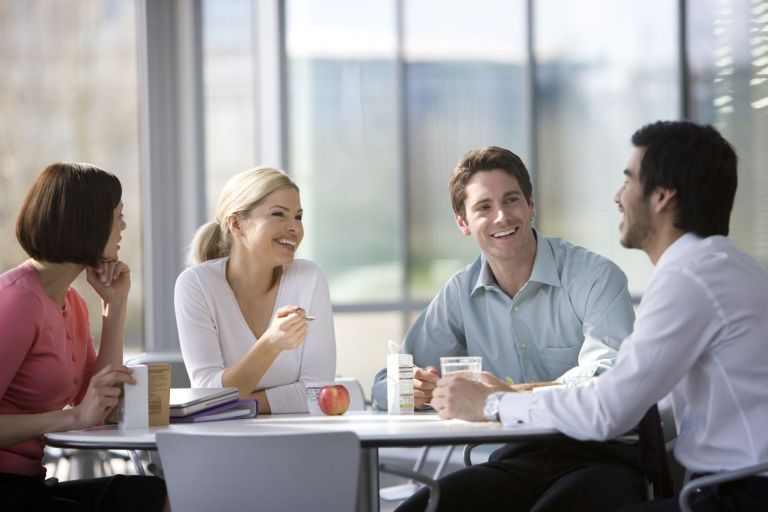 employees taking quick bites during break