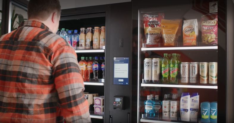 getting a meal at a smart cooler by Texas Vending