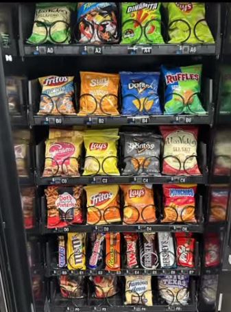 Fully stocked workplace vending machine maintained by a local vending company