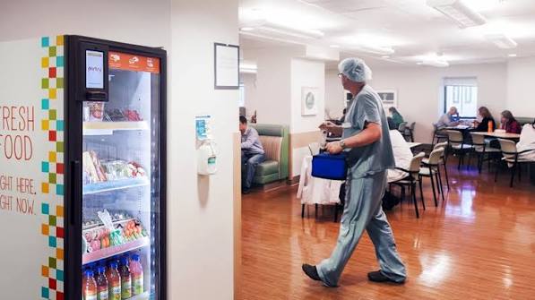 in scrub walking at the vending