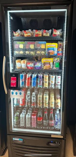 Fully stocked workplace vending machine maintained by a local vending company