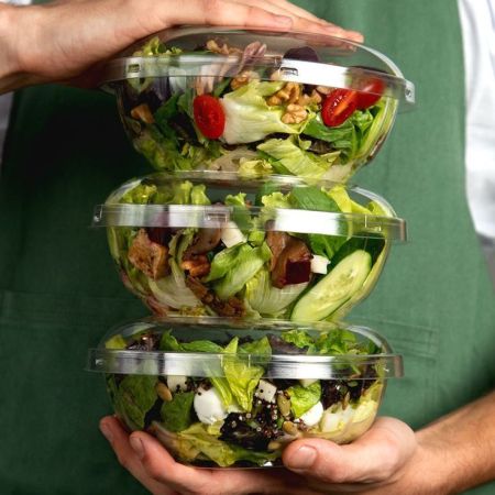 salad in plastic dome container